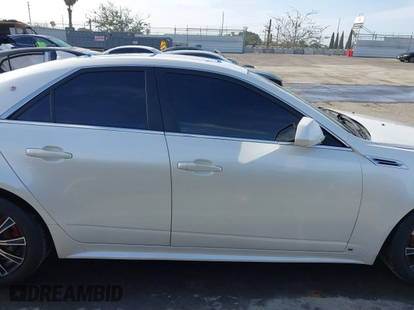2010 Cadillac CTS with VIN 1G6DK5EVXA0102844, listed as a IAAI auction lot 41818267 with 127,517 mi miles and . Bid and sale history available at DreamBid. Image 13.