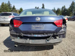 2014 Volkswagen Passat Wolfsburg Edition z VIN 1VWAT7A32EC036093, wystawiony jako Copart lot #52129185 z przebiegiem 106 949 mil mil oraz Szkoda całkowita • Salvage title. Historia ofert i sprzedaży dostępna na DreamBid. Obrazek 6.