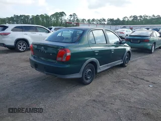 2000 Toyota ECHO z VIN JTDBT1234Y0008904, wystawiony jako IAAI lot #41998668 z przebiegiem 296 735 mil mil oraz . Historia ofert i sprzedaży dostępna na DreamBid. Obrazek 4.