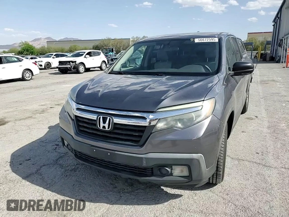 2017 Honda Ridgeline RT with VIN 5FPYK2F26HB008349, listed as a Copart auction lot 56672595 with 222,528 mi miles and Salvage title. Bid and sale history available at DreamBid. Image 13.