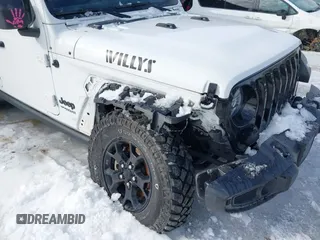 2022 Jeep Wrangler Unlimited Sport with VIN 1C4HJXDG2NW193577, listed as a IAAI auction lot 41634111 with 41,330 mi miles and . Bid and sale history available at DreamBid. Image 6.