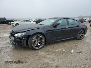 2015 BMW M6 z VIN WBS6C9C50FD467894, wystawiony jako Copart lot #70394234 z przebiegiem 72 625 mil mil oraz Szkoda całkowita • Salvage title. Historia ofert i sprzedaży dostępna na DreamBid. Obrazek 1.
