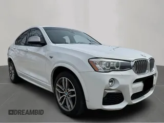 2018 BMW X4 M40i with VIN 5UXXW7C52J0W64992, listed as a Copart auction lot 53578695 with 97,697 mi miles and Clean Title. Bid and sale history available at carsss.com. Image 1.