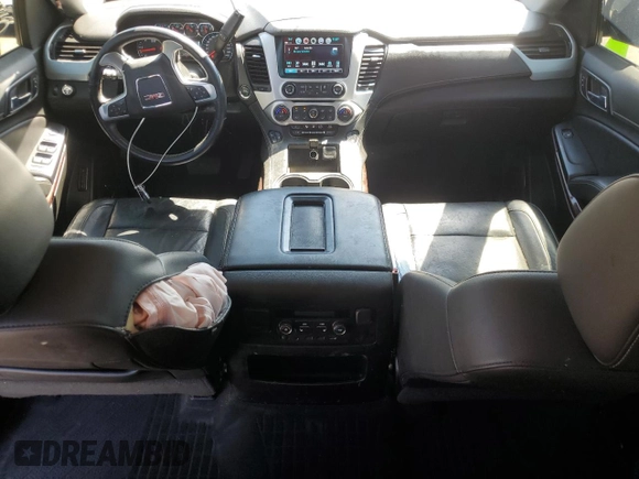 2019 GMC Yukon SLT with VIN 1GKS1BKC1KR117730, listed as a Copart auction lot 49438235 with 147,347 mi miles and Salvage Title. Bid and sale history available at carsss.com. Image 8.