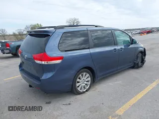 2014 Toyota Sienna Limited with VIN 5TDDK3DC5ES077601, listed as a IAAI auction lot 42163071 with 168,000 mi miles and . Bid and sale history available at DreamBid. Image 4.