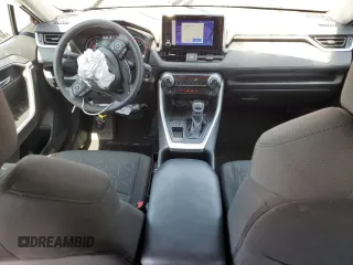 2023 Toyota RAV4 XLE with VIN 2T3W1RFV4PW267940, listed as a Copart auction lot 61827935 with 63,356 mi miles and Salvage title. Bid and sale history available at DreamBid. Image 8.