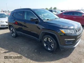 2021 Jeep Compass Altitude with VIN 3C4NJCBB0MT502423, listed as a IAAI auction lot 42006742 with 63,418 mi miles. Bid and sale history available at carsss.com. Image 1.