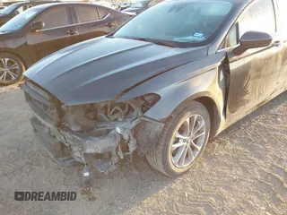 2020 Ford Fusion SE with VIN 3FA6P0HD7LR168404, listed as a IAAI auction lot 41763314 with 121,004 mi miles and . Bid and sale history available at DreamBid. Image 6.