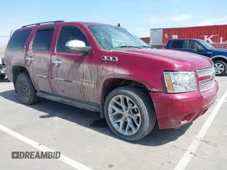 2007 Chevrolet Tahoe LT z VIN 1GNFK13037R404722, wystawiony jako IAAI lot #41971336 z przebiegiem 176 429 mil mil oraz . Historia ofert i sprzedaży dostępna na DreamBid. Obrazek 1.