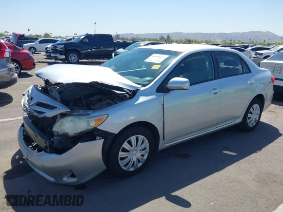 2011 Toyota Corolla L with VIN JTDBU4EE0B9151332, listed as a IAAI auction lot 41970433 with 113,157 mi miles. Bid and sale history available at carsss.com. Image 2.