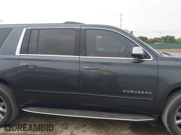 2020 Chevrolet Suburban Premier with VIN 1GNSCJKC8LR290783, listed as a IAAI auction lot 42636126 with 59,371 mi miles and . Bid and sale history available at DreamBid. Image 13.