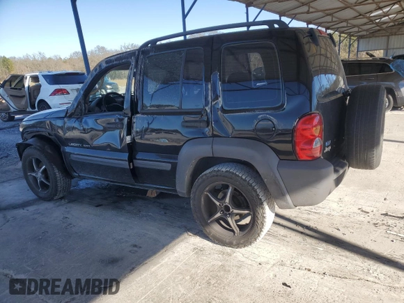 2003 Jeep Liberty Sport with VIN 1J4FK481X3W725304, listed as a Copart auction lot 87003384 with 185,646 mi miles and Salvage Title. Bid and sale history available at DreamBid. Image 2.