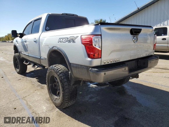 2017 Nissan Titan XD SV with VIN 1N6BA1F4XHN521471, listed as a Copart auction lot 76291024 with 100,447 mi miles and Salvage Title. Bid and sale history available at carsss.com. Image 2.