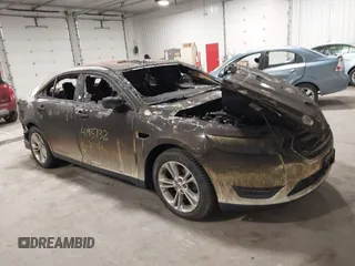 2014 Ford Taurus SEL with VIN 1FAHP2E81EG136022, listed as a IAAI auction lot 41937132 with 76,285 mi miles and . Bid and sale history available at DreamBid. Image 6.