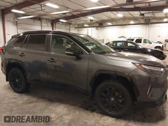 2023 Toyota RAV4 Hybrid XSE with VIN 4T3E6RFV7PU124140, listed as a IAAI auction lot 42201073 with 50,942 mi miles and . Bid and sale history available at DreamBid. Image 13.