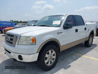 2006 Ford F-150 XLT with VIN 1FTPW14566KB42469, listed as a IAAI auction lot 42074416 with 406,937 mi miles. Bid and sale history available at carsss.com. Image 2.