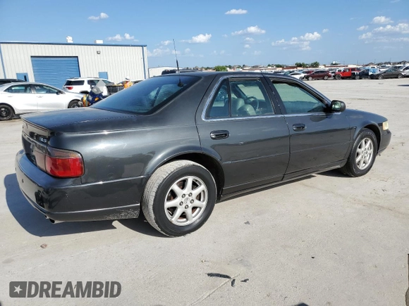 2002 Cadillac Seville Luxury SLS z VIN 1G6KS54YX2U154438, wystawiony jako Copart lot #67893314 z przebiegiem 115 313 mil mil oraz Szkody całkowita. Historia ofert i sprzedaży dostępna na DreamBid. Obrazek 3.