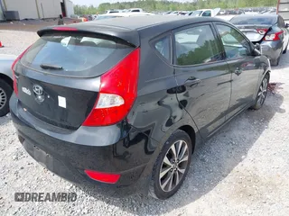 2015 Hyundai Accent Sport with VIN KMHCU5AE5FU233054, listed as a IAAI auction lot 41932298 with 70,278 mi miles. Bid and sale history available at carsss.com. Image 4.