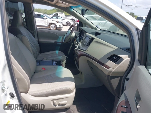 2011 Toyota Sienna XLE AAS with VIN 5TDYK3DC5BS037533, listed as a IAAI auction lot 42519756 with 235,000 mi miles and . Bid and sale history available at DreamBid. Image 5.