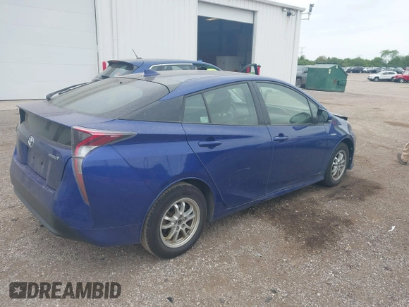 2016 Toyota Prius Two z VIN JTDKBRFU3G3511809, wystawiony jako IAAI lot #42295946 z przebiegiem 118 621 mil mil oraz . Historia ofert i sprzedaży dostępna na DreamBid. Obrazek 4.