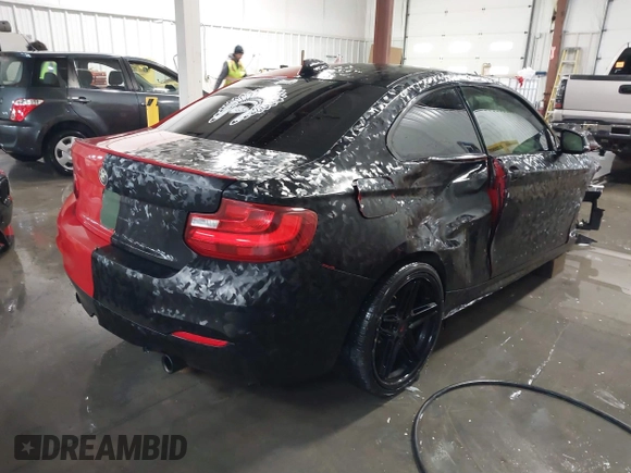 2016 BMW 2 Series M235i with VIN WBA1J7C50GV360056, listed as a IAAI auction lot 41560487 with 120,208 mi miles and . Bid and sale history available at carsss.com. Image 4.