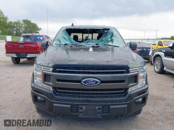 2018 Ford F-150 XL with VIN 1FTEW1E56JKF92265, listed as a IAAI auction lot 42285305 with 95,712 mi miles and . Bid and sale history available at DreamBid. Image 12.