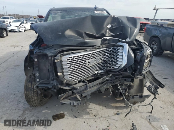 2015 GMC Yukon Denali with VIN 1GKS1CKJ2FR699959, listed as a Copart auction lot 42035195 with 0 mi miles and Salvage Title. Bid and sale history available at carsss.com. Image 5.