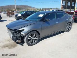 2017 Nissan Maxima SR with VIN 1N4AA6AP4HC453943, listed as a IAAI auction lot 41888527 with 130,577 mi miles. Bid and sale history available at carsss.com. Image 2.