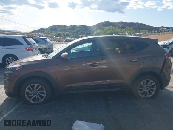 2016 Hyundai Tucson SE z VIN KM8J23A47GU166435, wystawiony jako IAAI lot #41952751 z przebiegiem 66 785 mil mil oraz . Historia ofert i sprzedaży dostępna na DreamBid. Obrazek 13.