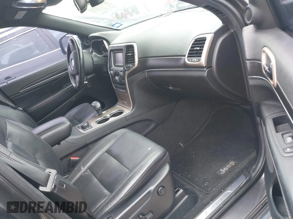 2014 Jeep Grand Cherokee Limited with VIN 1C4RJFBG4EC227165, listed as a IAAI auction lot 42135232 with 105,873 mi miles. Bid and sale history available at carsss.com. Image 5.