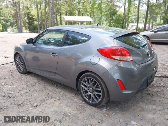2012 Hyundai Veloster w/Black Int with VIN KMHTC6AD3CU078547, listed as a IAAI auction lot 42633915 with 143,633 mi miles and . Bid and sale history available at DreamBid. Image 3.