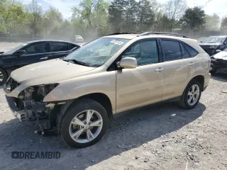 2008 Lexus RX 400h with VIN JTJGW31UX82007745, listed as a Copart auction lot 52857445 with 159,062 mi miles and Salvage Title. Bid and sale history available at DreamBid. Image 1.