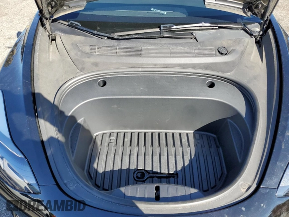 2023 Tesla Model 3 z VIN 5YJ3E1EA4PF706521, wystawiony jako Copart lot #49295465 z przebiegiem 25 026 mil mil oraz Szkoda całkowita • Salvage title. Historia ofert i sprzedaży dostępna na DreamBid. Obrazek 13.