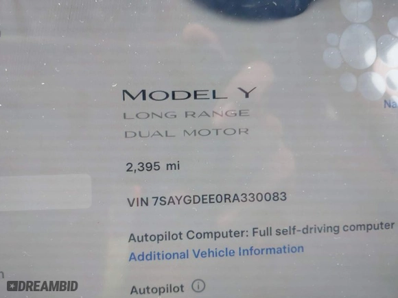 2024 Tesla Model Y Long Range with VIN 7SAYGDEE0RA330083, listed as a IAAI auction lot 41245099 with NaN miles. Bid and sale history available at carsss.com. Image 7.