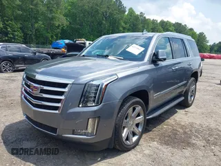 2020 Cadillac Escalade Luxury z VIN 1GYS3BKJ0LR116410, wystawiony jako IAAI lot #42274841 z przebiegiem 75 513 mil mil oraz . Historia ofert i sprzedaży dostępna na DreamBid. Obrazek 19.