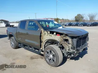 2023 GMC Canyon 4WD AT4 with VIN 1GTP6DEK1P1174713, listed as a IAAI auction lot 41733242 with 35,705 mi miles. Bid and sale history available at carsss.com. Image 1.