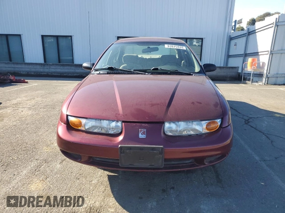 2001 Saturn SL z VIN 1G8ZK54731Z305098, wystawiony jako Copart lot #83875424 z przebiegiem 82 879 mil mil oraz Tytuł czysty. Historia ofert i sprzedaży dostępna na DreamBid. Obrazek 5.