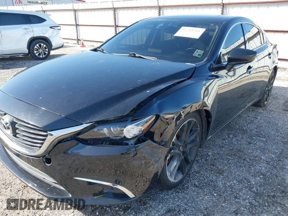 2016 Mazda 6 i Grand Touring with VIN JM1GJ1W50G1478699, listed as a IAAI auction lot 41711211 with 208,720 mi miles and . Bid and sale history available at DreamBid. Image 6.