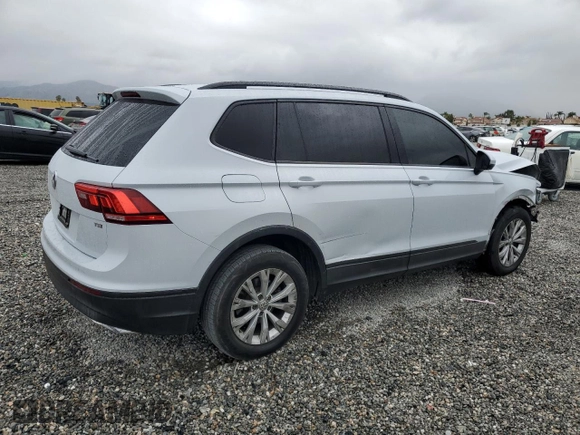 2018 Volkswagen Tiguan S with VIN 3VV1B7AXXJM067370, listed as a Copart auction lot 53645945 with 143,137 mi miles and Salvage title. Bid and sale history available at DreamBid. Image 3.