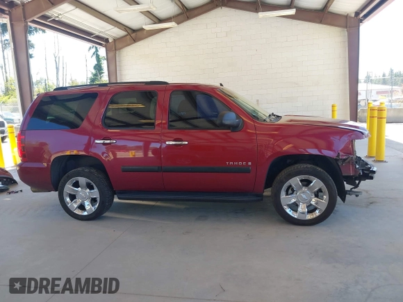 2007 Chevrolet Tahoe LS with VIN 1GNFC13C07R256584, listed as a IAAI auction lot 42678748 with 214,040 mi miles and . Bid and sale history available at DreamBid. Image 14.