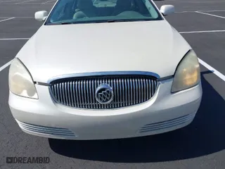 2009 Buick Lucerne CXL with VIN 1G4HD57M59U107527, listed as a IAAI auction lot 41934369 with 226,995 mi miles. Bid and sale history available at carsss.com. Image 6.