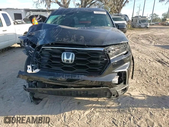 2023 Honda Pilot Touring with VIN 5FNYG2H77PB006594, listed as a Copart auction lot 83662854 with 37,637 mi miles and Salvage Title. Bid and sale history available at DreamBid. Image 12.
