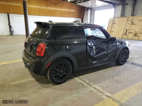 2016 MINI Cooper Hardtop S with VIN WMWXP7C58G3B49825, listed as a Copart auction lot 70988364 with 106,474 mi miles and Salvage Title. Bid and sale history available at carsss.com. Image 3.