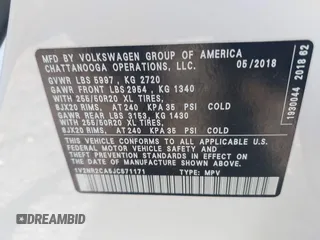 2018 Volkswagen Atlas SEL Premium with VIN 1V2NR2CA5JC571171, listed as a IAAI auction lot 42174807 with 131,690 mi miles and . Bid and sale history available at DreamBid. Image 9.