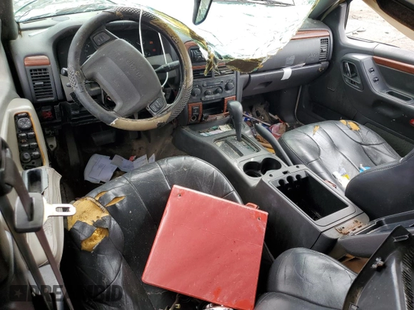 1999 Jeep Grand Cherokee Limited with VIN 1J4G268S2XC756532, listed as a Copart auction lot 71222174 with 279,300 mi miles and Salvage title. Bid and sale history available at DreamBid. Image 8.
