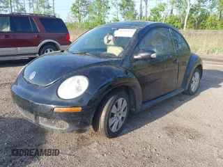 2009 Volkswagen New Beetle Coupe S with VIN 3VWPW31C79M517049, listed as a IAAI auction lot 41944475 with 100,204 mi miles. Bid and sale history available at carsss.com. Image 2.