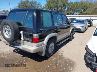 2002 Isuzu Trooper S with VIN JACDS58X227J00202, listed as a IAAI auction lot 41717506 with 164,206 mi miles and . Bid and sale history available at DreamBid. Image 4.