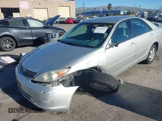 2002 Toyota Camry XLE z VIN 4T1BF30K82U506516, wystawiony jako IAAI lot #41278261 z przebiegiem 211 049 mil mil oraz . Historia ofert i sprzedaży dostępna na DreamBid. Obrazek 6.