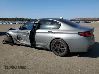 2023 BMW 5 Series M550i xDrive with VIN WBA13BK09PCN61839, listed as a Copart auction lot 76614694 with 16,279 mi miles and Salvage title. Bid and sale history available at DreamBid. Image 2.