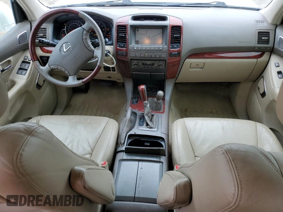 2009 Lexus GX 470 z VIN JTJBT20X690177574, wystawiony jako Copart lot #56981165 z przebiegiem 167 415 mil mil oraz Szkoda całkowita • Salvage title. Historia ofert i sprzedaży dostępna na DreamBid. Obrazek 8.